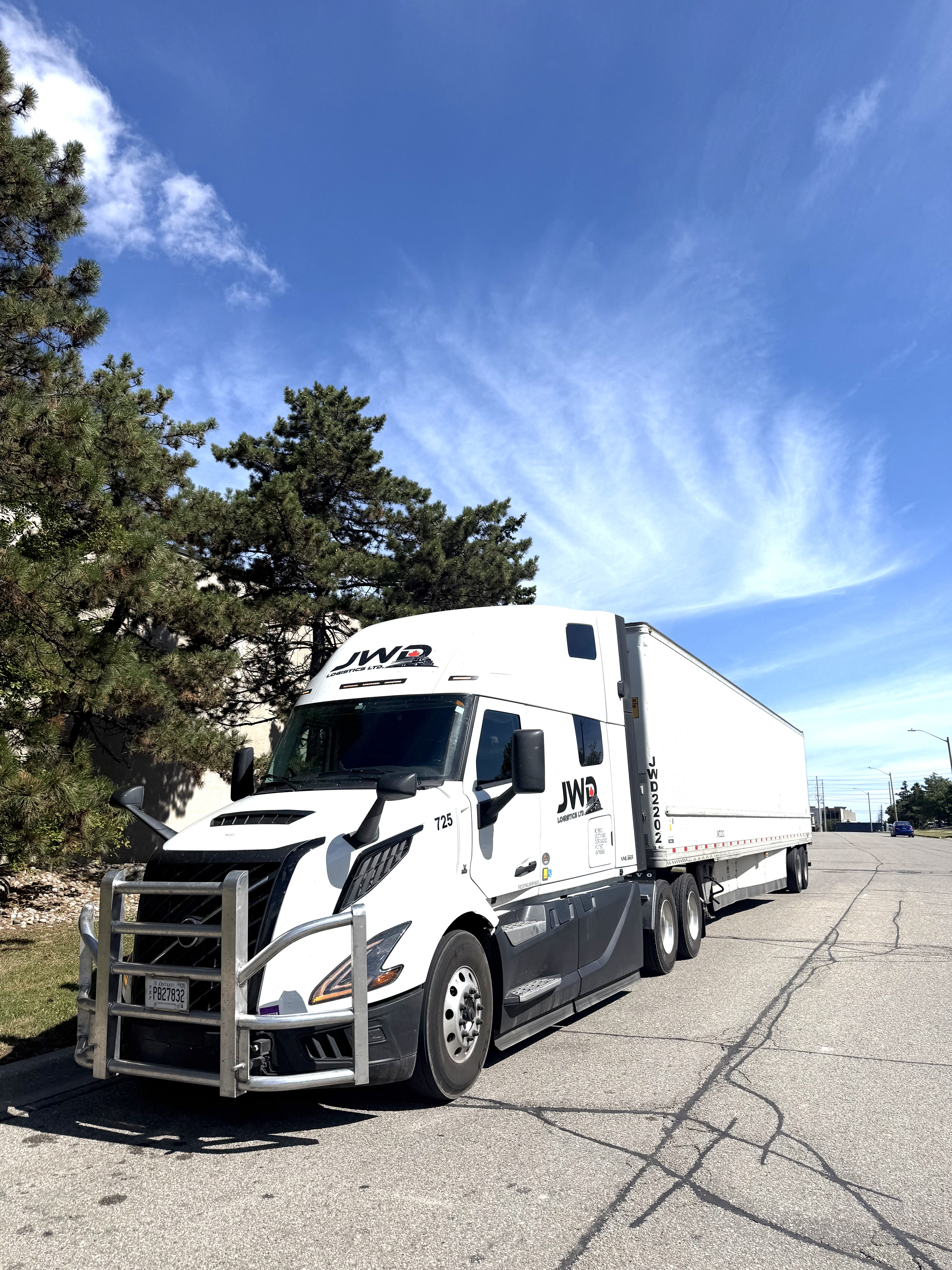 JWD Logistics dry van tractor-trailer parked at the Mississauga terminal.